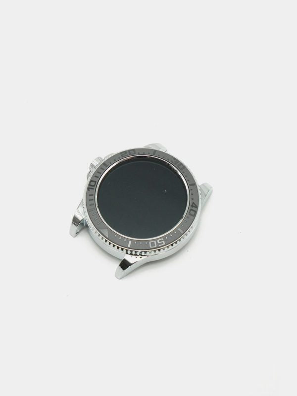 Silver watch case with black interior on a white background
