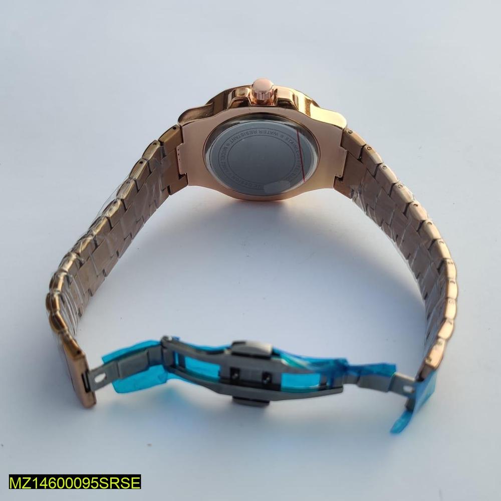 Rose gold watch with a blue band on a light gray background